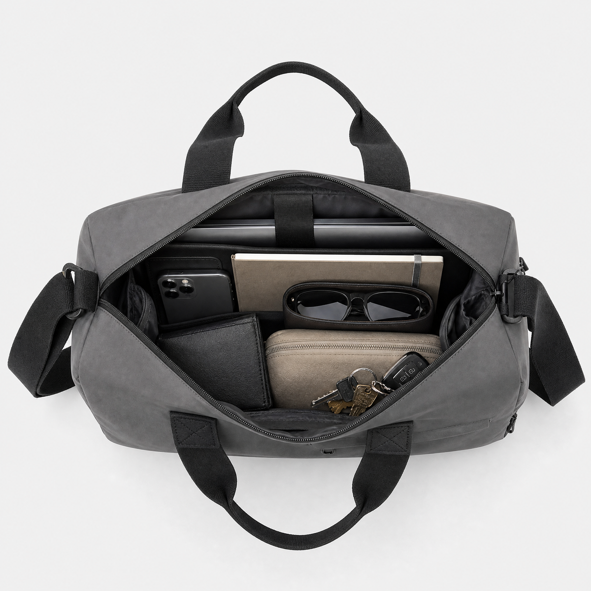 Sac de Voyage Etanche, coloris Gris, sac ouvert avec effets personnels