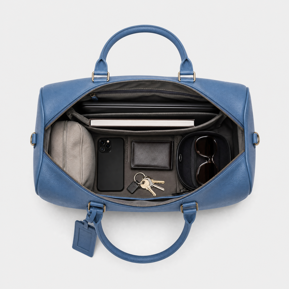 Sac en Cuir de Voyage pour Homme, coloris Bleu, sac ouvert avec effets personnels
