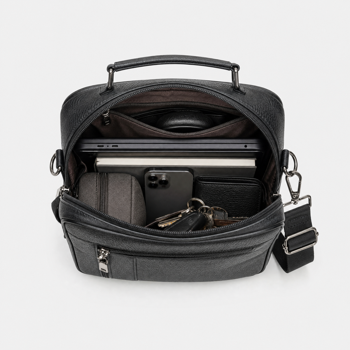 Sacoche Bandouliere Homme Cuir, coloris Noir, sac ouvert avec effets personnels