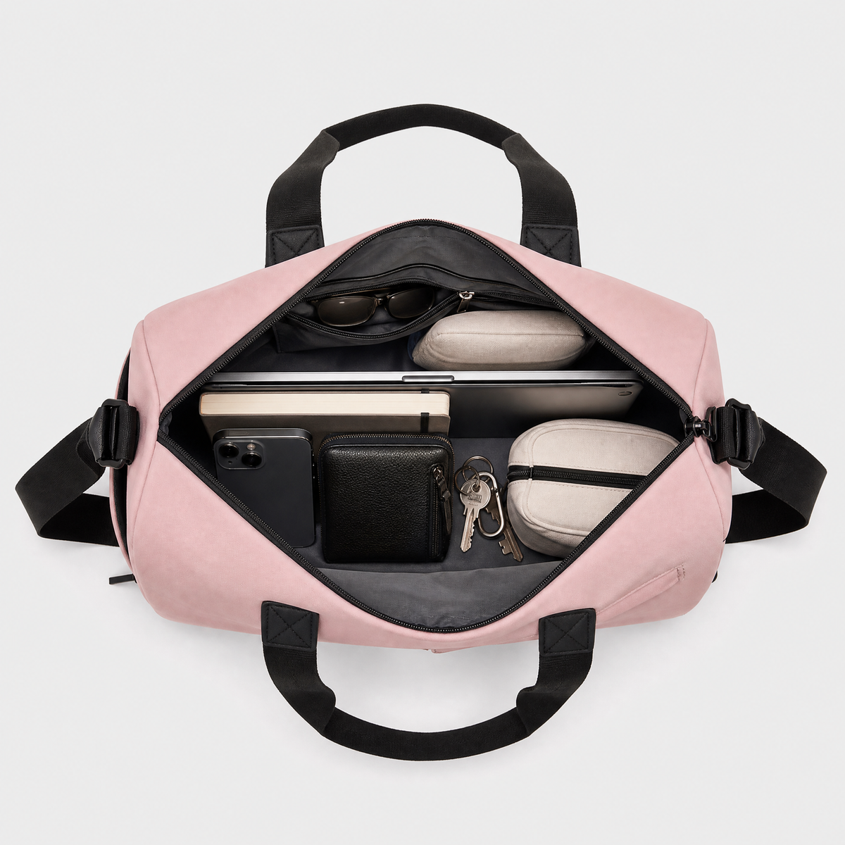 Sac de Voyage Etanche, coloris Rose, sac ouvert avec effets personnels