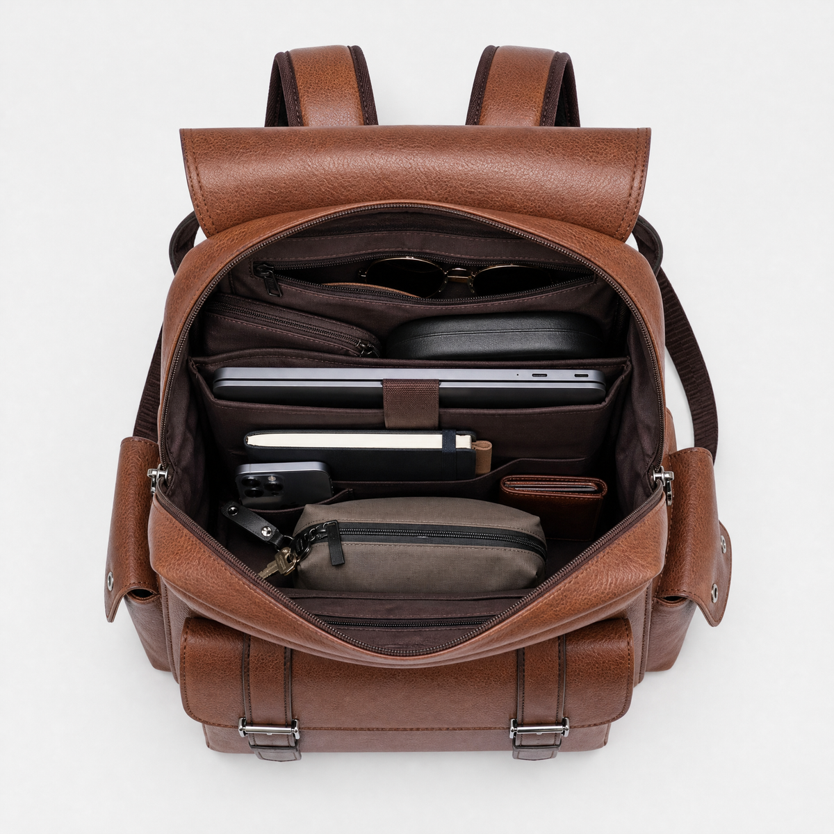 Sac a Dos Homme en Cuir, coloris Marron, sac ouvert avec effets personnels